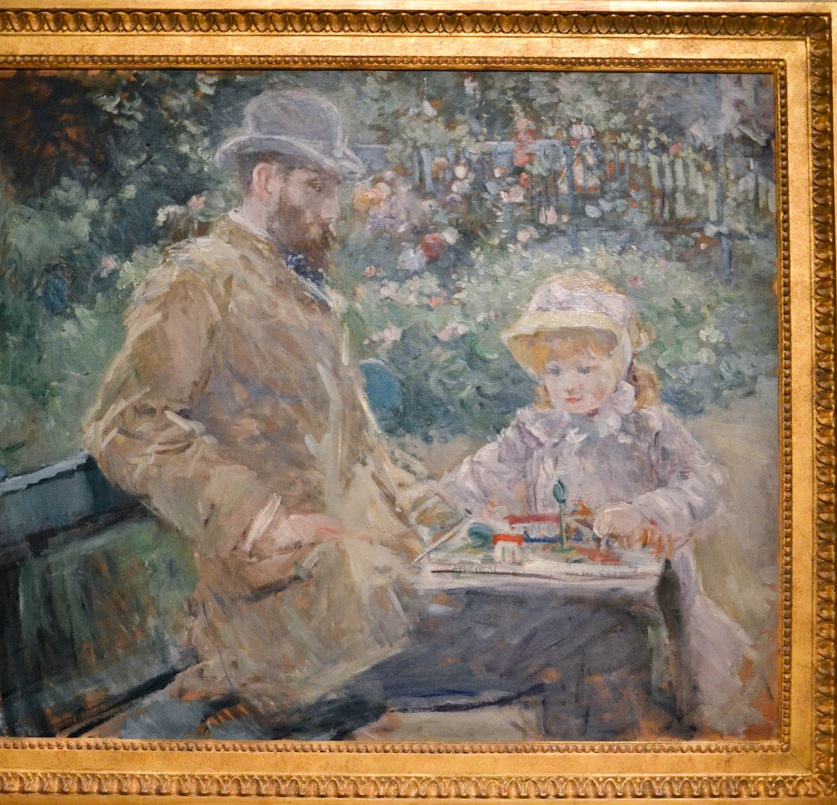 Eugène Manet et sa fille dans le jardin de Bougival